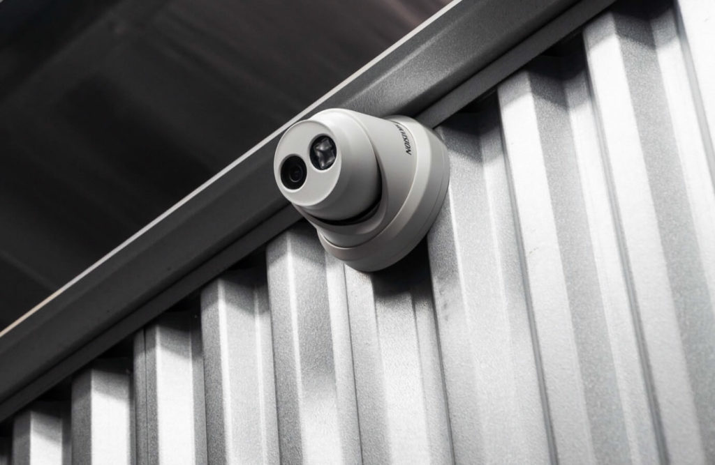 Security camera mounted on wall