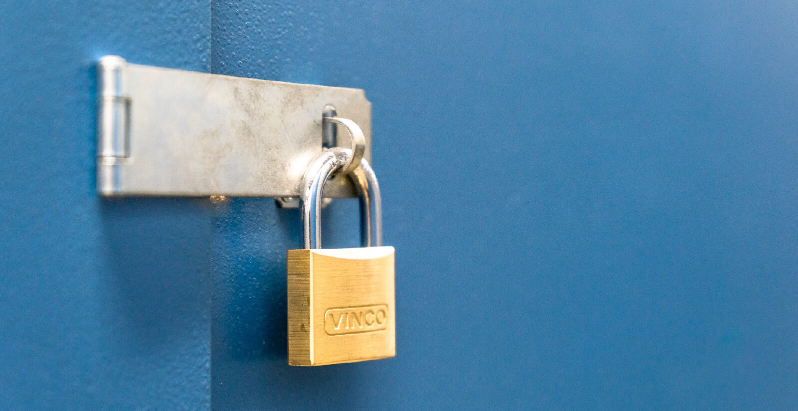 Padlock on storage unit handle