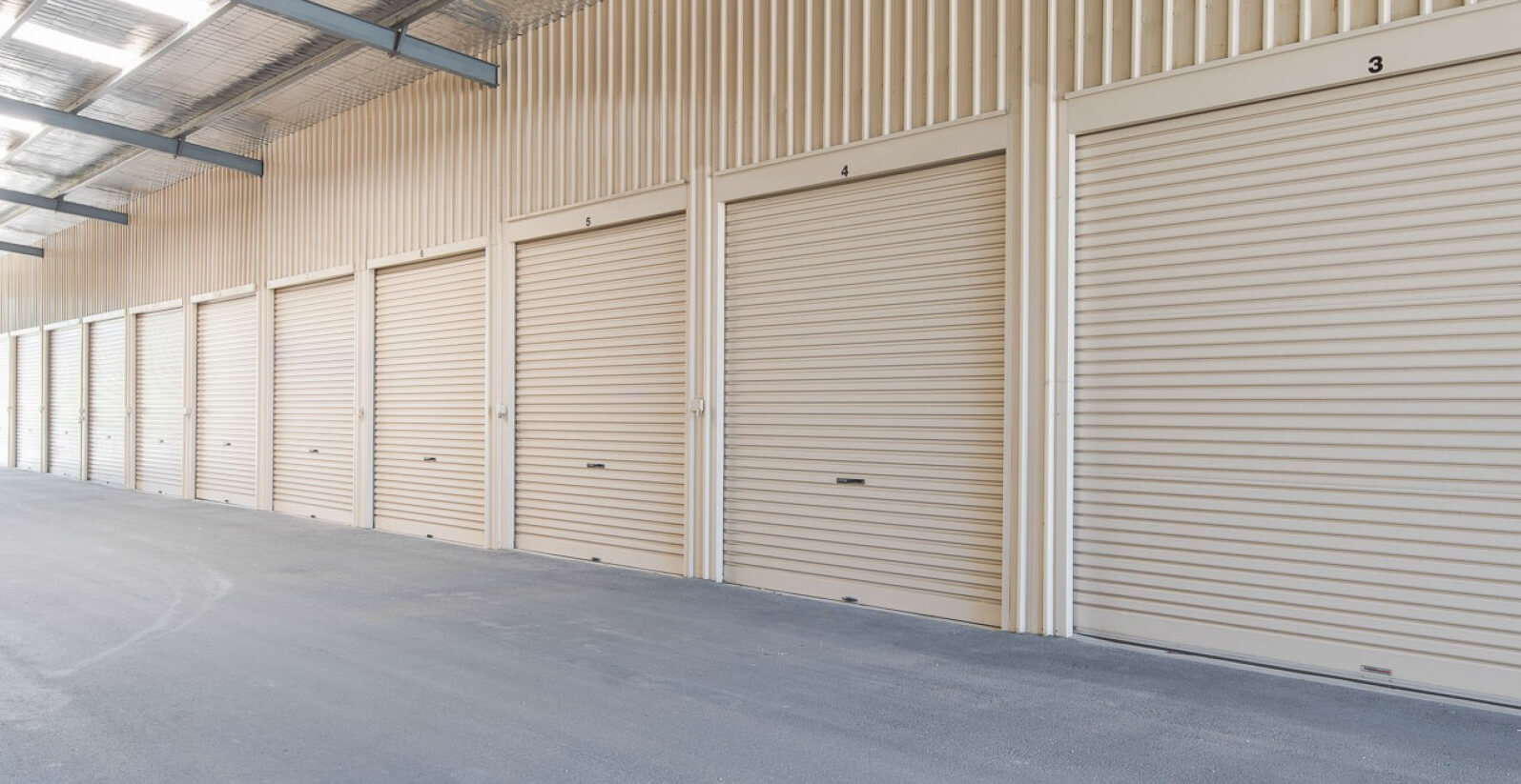 Multiple undercover roller door units
