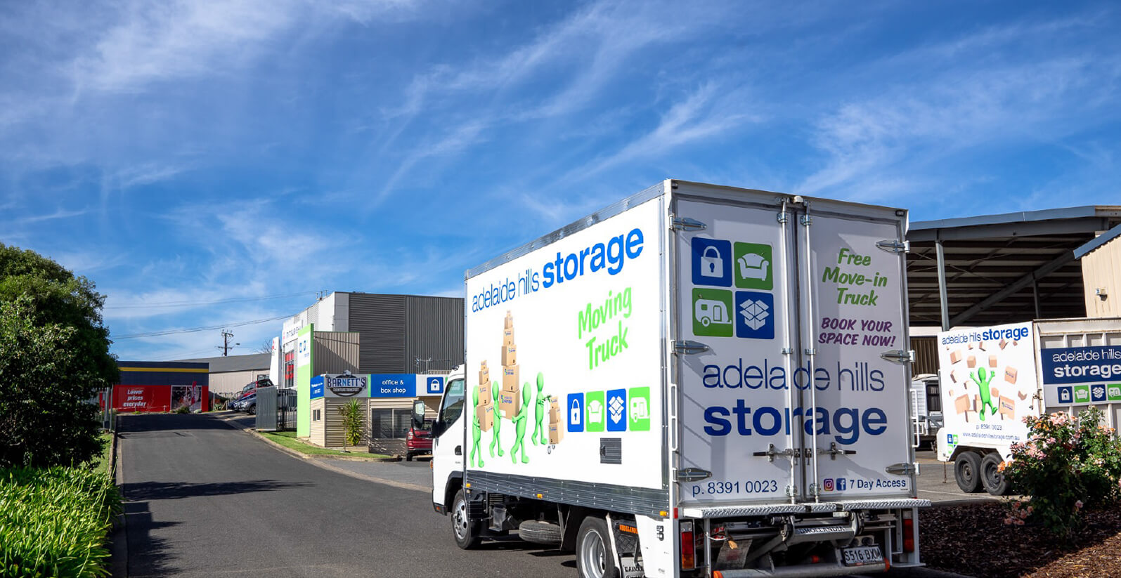 Removal truck driving out of facility