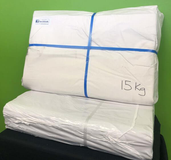 White packing paper wrapped around two packages